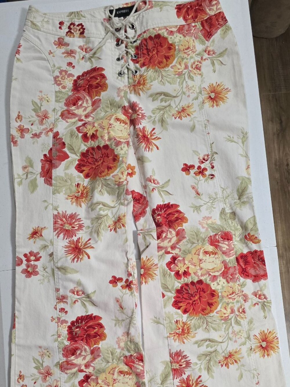 Express fall floral bell bottom jeans